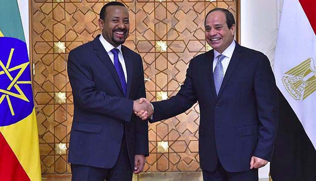 Ethiopian Prime Minister Abiy Ahmed shakes hands with Egyptian President Abdel-Fattah el-Sissi, June 10, 2018